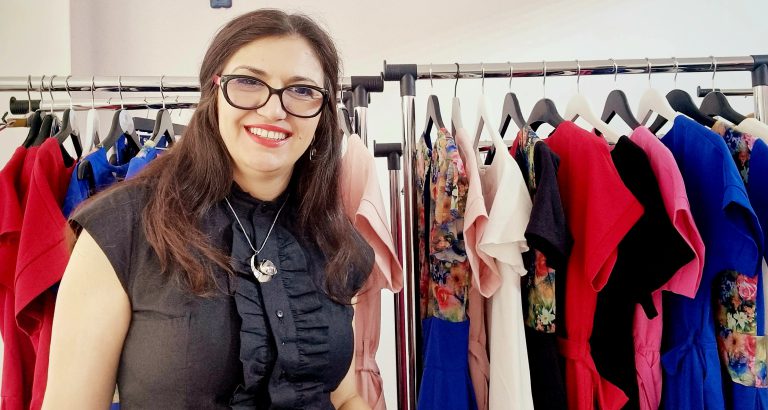 Fashion designer Bibi Sakalieva in studio with garments representing the creative process and philosophy behind BIBI SAKALIEVA Journal