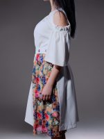 Elegant white dress with ruffled sleeves and removable floral kilt skirt