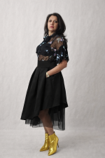 Asymmetrical black satin midi skirt with symmetrical tulle underlayer, modern feminine design by BIBI SAKALIEVA