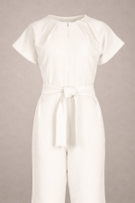 Off-white elegant women’s jumpsuit with wide-leg trousers and soft pleated neckline, minimalist handmade designer piece.