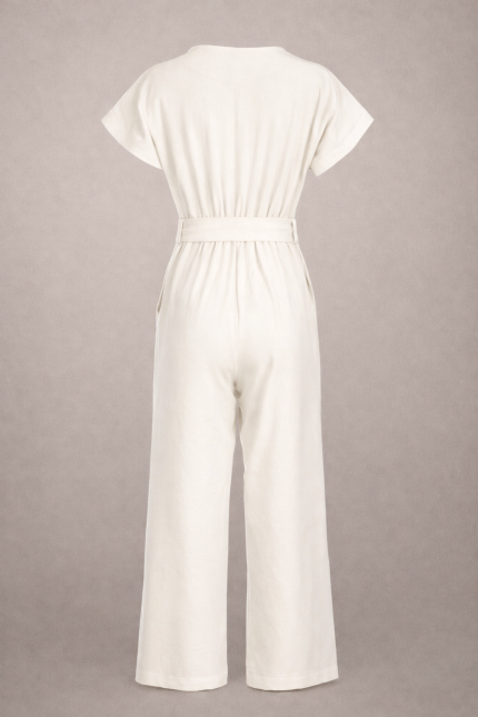 Back view of off-white wide-leg jumpsuit for women with fluid silhouette and tailored waist, minimalist luxury design.