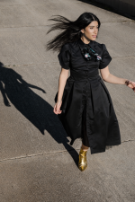 Black midi dress with detachable floral fichu and classic collar detail