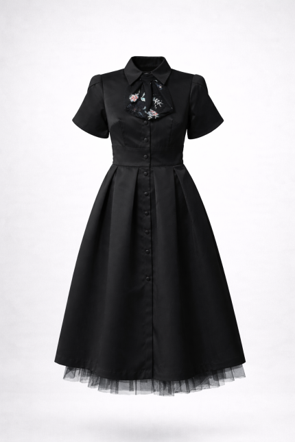 Black midi dress with open back, removable tulle skirt and defined waist, front view