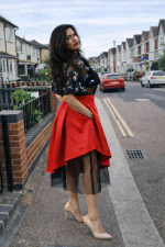 red asymmetric satin midi skirt