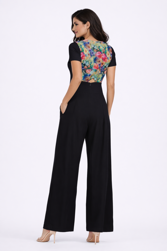Black Jumpsuit with Shoulder Cut-Outs -outs features a softly