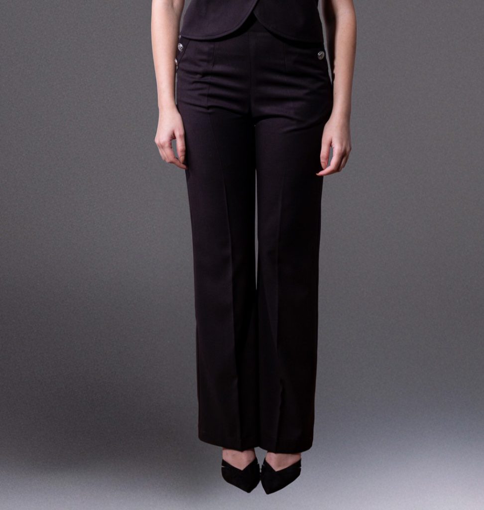 High-waisted black tailored trousers with side button fastening and front pockets.