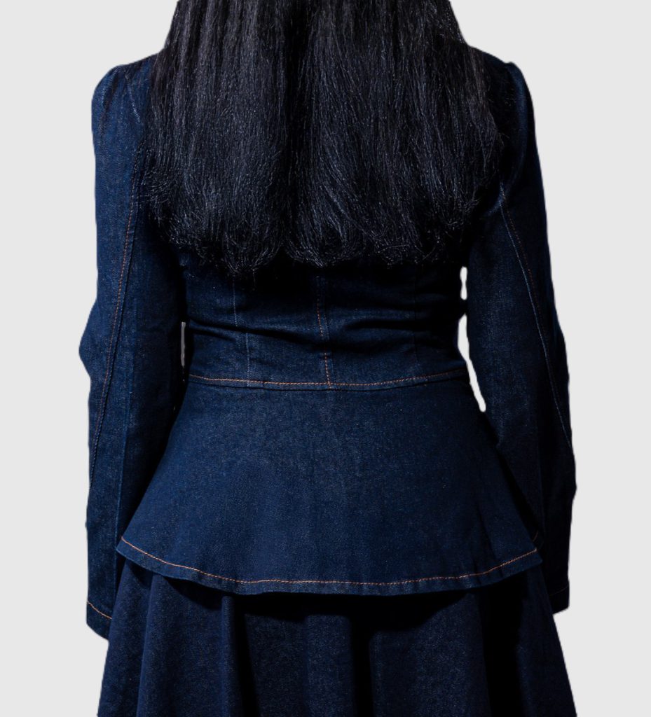 Women’s military-style denim jacket with contrast dark and light denim panels, decorative buttons, and YKK front zip by BIBI SAKALIEVA