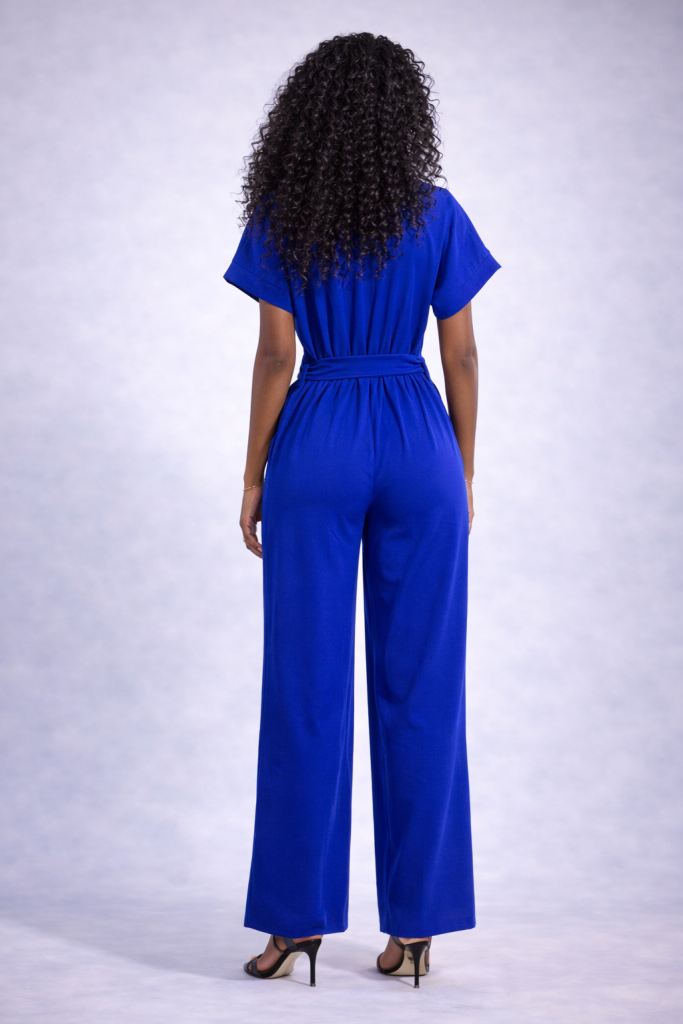 Back view of royal blue wide-leg jumpsuit for women with short sleeves and wide-leg trousers by BIBI SAKALIEVA