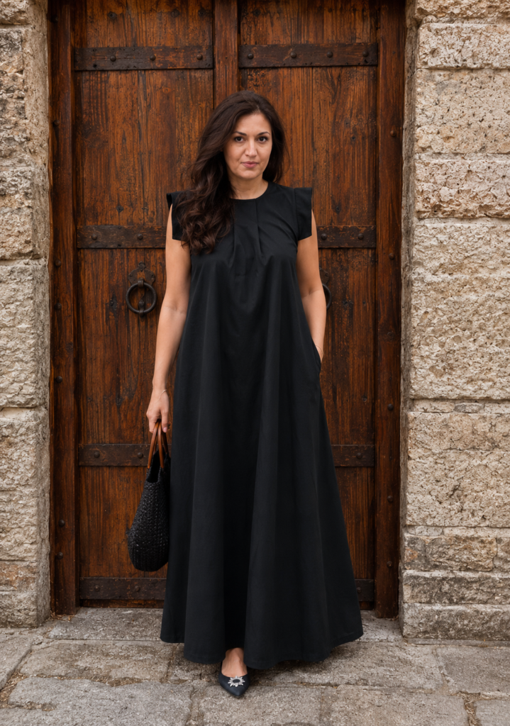 Woman wearing black linen maxi summer dress with hidden side pockets – BIBI SAKALIEVA